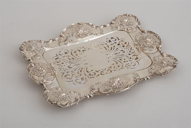 Appraisal: AMERICAN SILVER TRAY AND LINER The tray with lion-headed dolphin