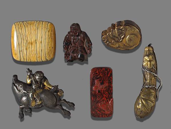 Appraisal: A group of seven ivory wood and metal items Most