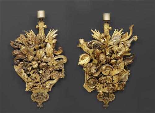 Appraisal: PAIR OF CARVED GILTWOOD APPLIQUES Baroque Northern Italy th century