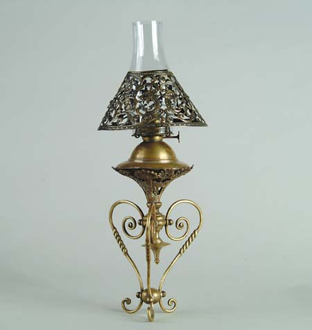 Appraisal: MINIATURE BRASS-STYLE LAMP Open wire base has decorative font frame