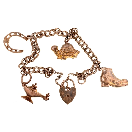 Appraisal: A ct gold charm bracelet and padlock cm l g