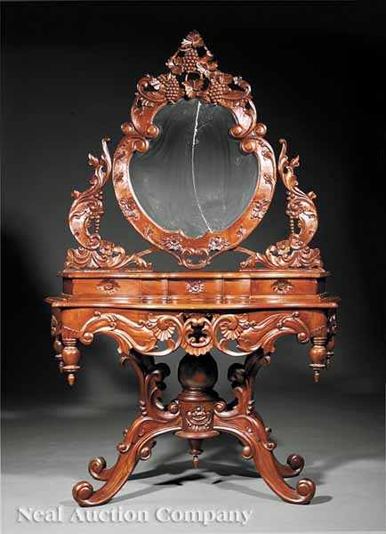 Appraisal: A Rococo Revival-Style Carved Mahogany Duchesse Dressing Table th c