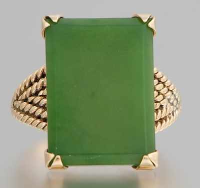 Appraisal: A Jade and Gold Ring k yellow gold ring with