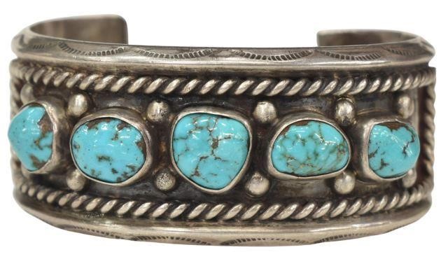 Appraisal: Native American silver content unknown cuff bracelet five bezel-set turquoise