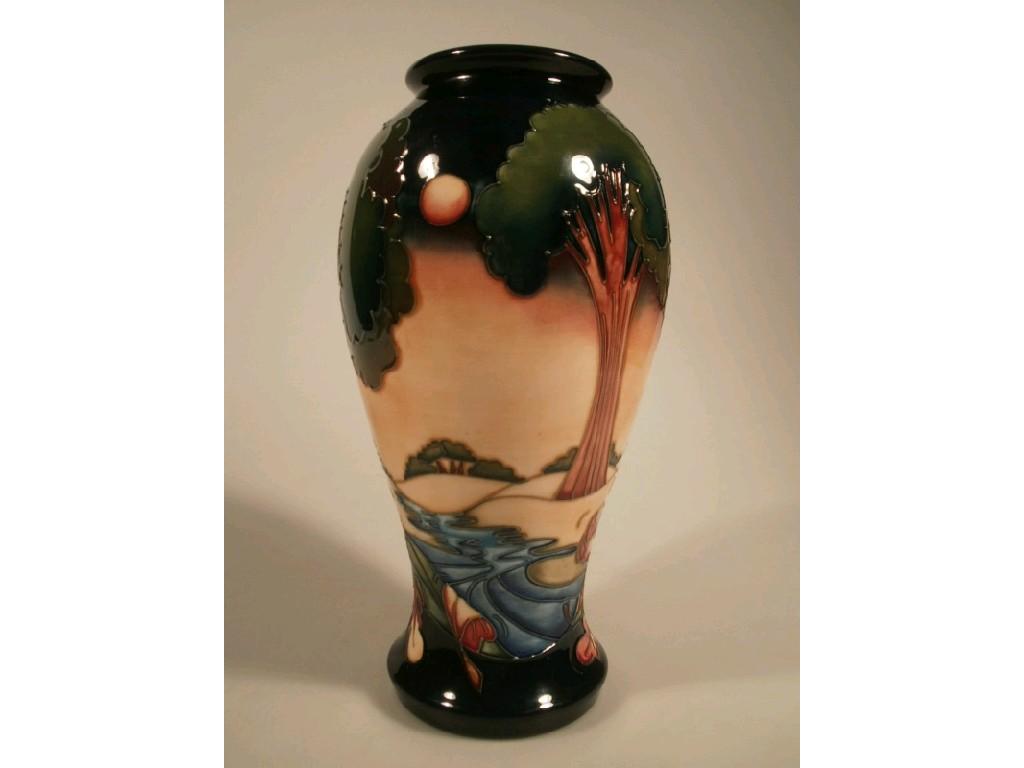 Appraisal: A Moorcroft baluster vase decorated with landscape and river decoration