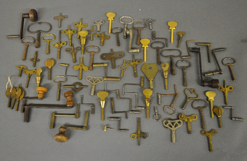 Appraisal: - Grouping of brass and iron clock keys mostly th