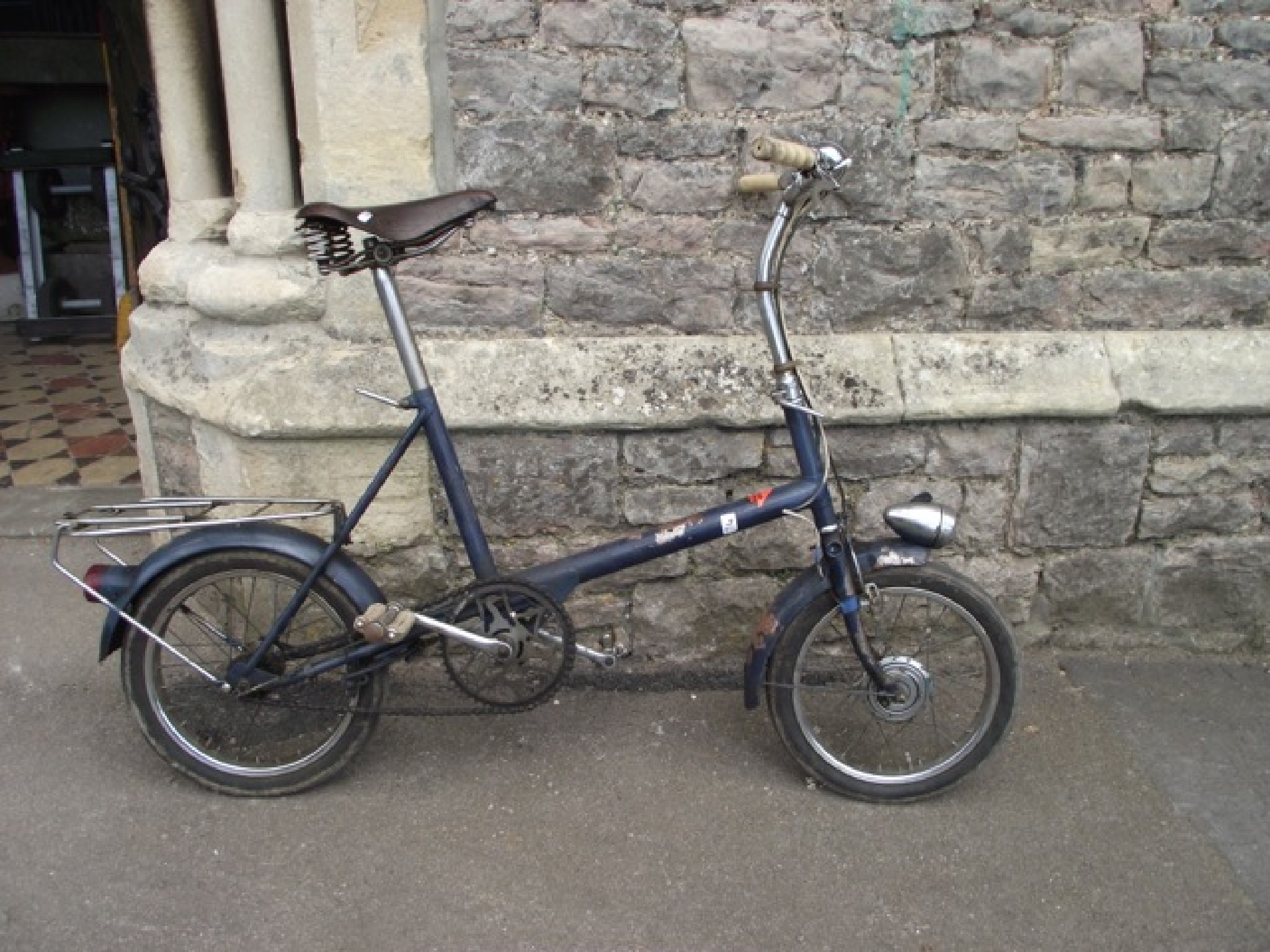 Appraisal: A vintage Raleigh ladies bicycle with tubular steel frame leather