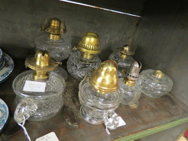 Appraisal: Antique Oil Lamps all chamberstick style