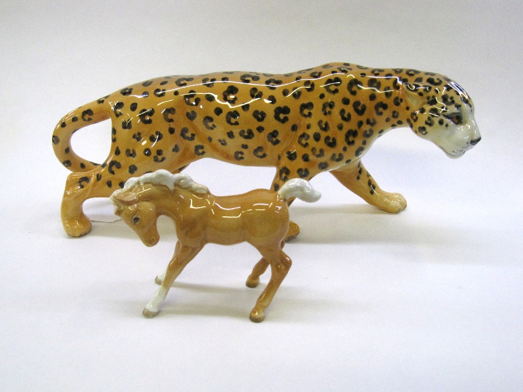 Appraisal: Beswick figure of a leopard model no and a Beswick