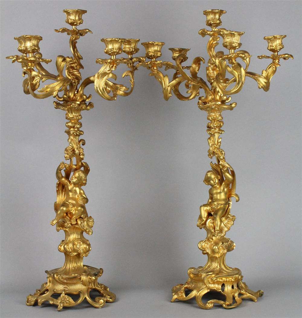 Appraisal: PAIR OF LOUIS XV STYLE FIVE LIGHT GILT BRONZE CANDELABRA