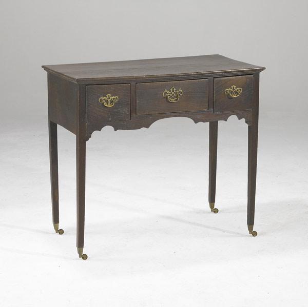 Appraisal: ENGLISH DRESSING TABLE Oak with brass pulls on three drawers