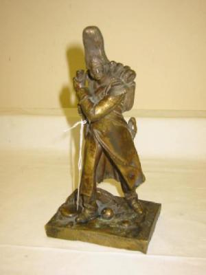 Appraisal: A BRONZE FIGURE of a Russian soldier modelled in bearskin