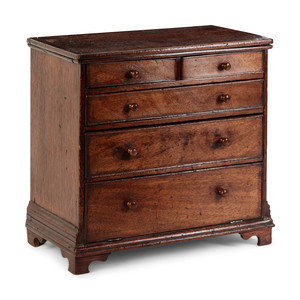 Appraisal: A Diminutive Walnut Chest of Drawers th Century Height x