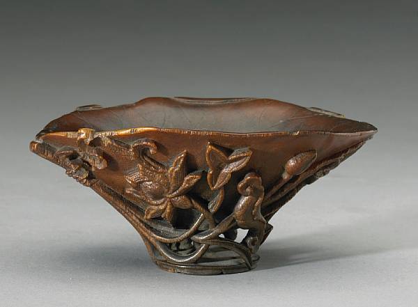 Appraisal: A rhinoceros horn libation cup th th Century Of oval