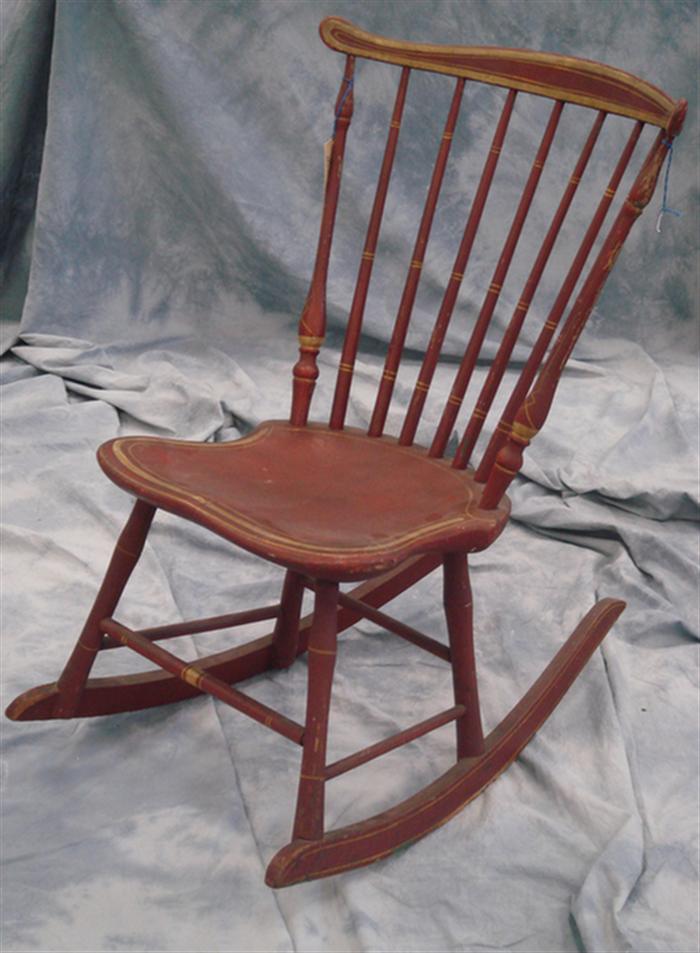 Appraisal: Windsor fan-back rocking chair c Serpentine crest rail over seven