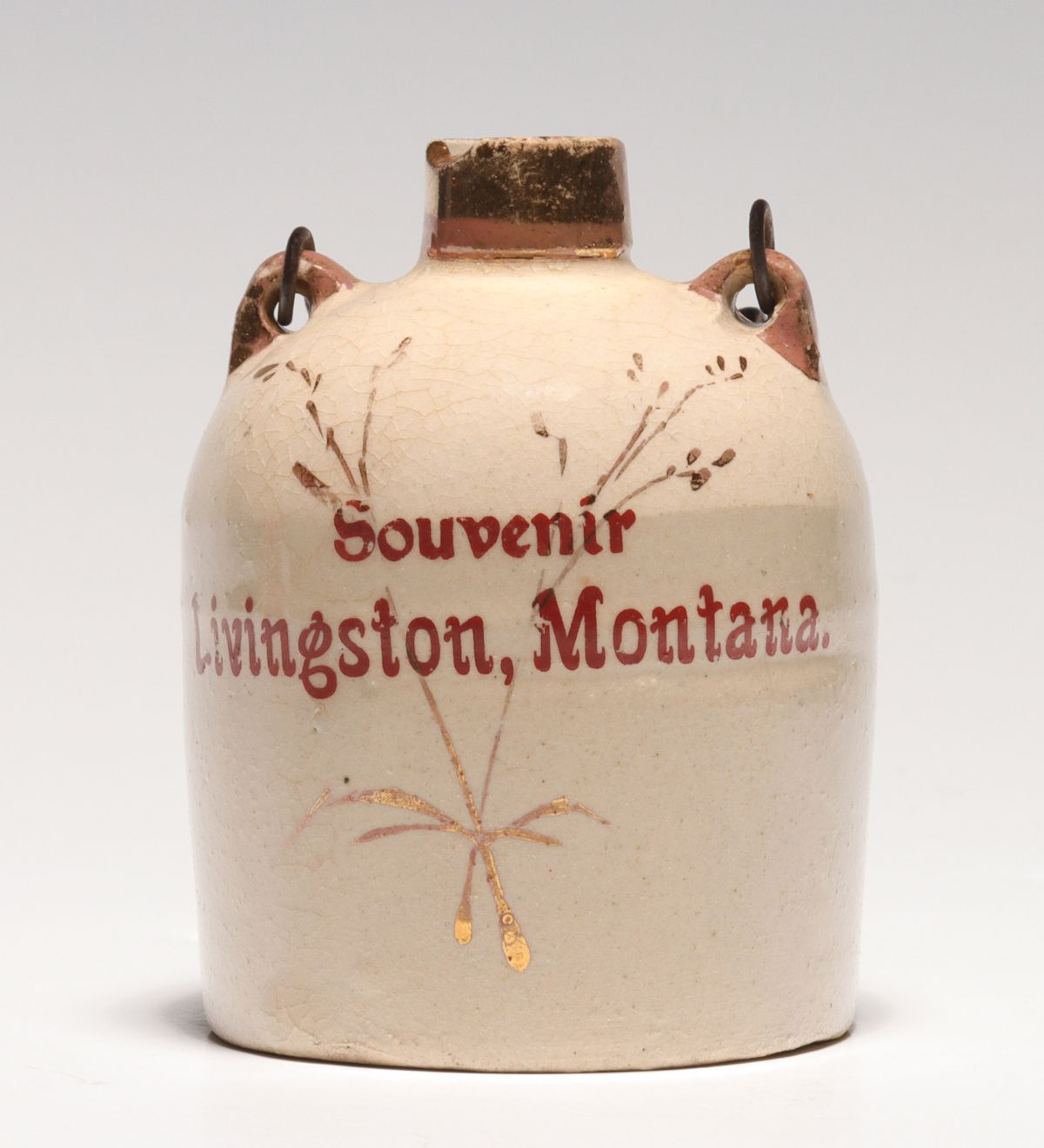 Appraisal: A LIVINGSTON MONTANA BAIL HANDLE STONEWARE MINI JUGThe condition is