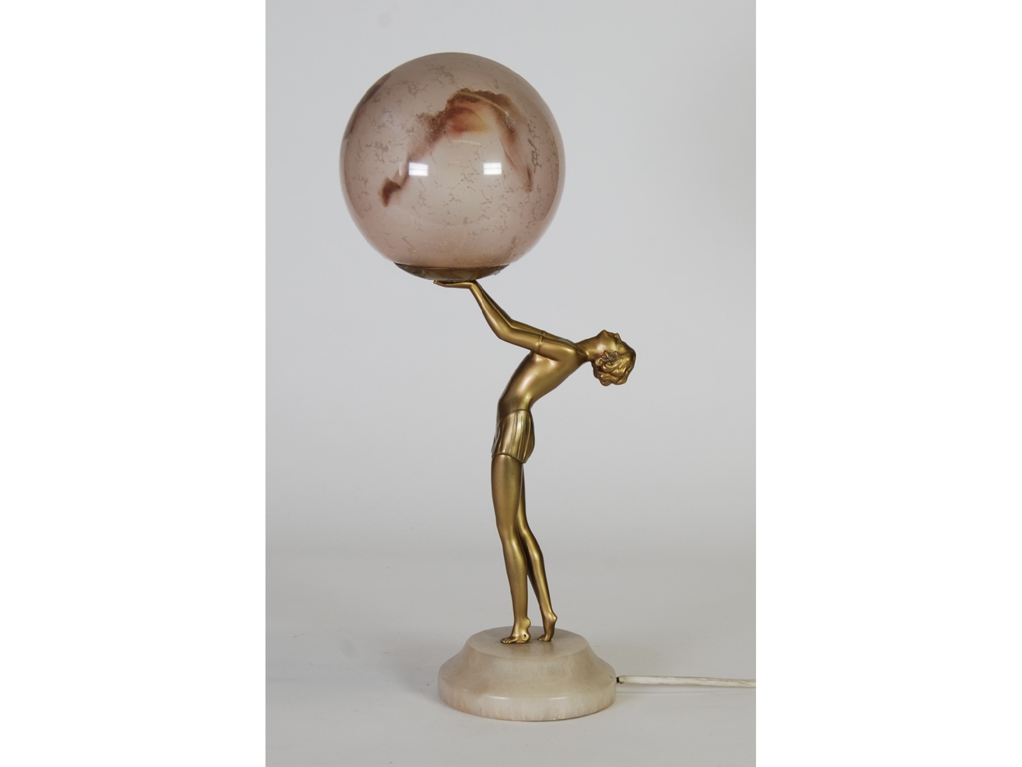 Appraisal: AN ART DECO STYLE GILT METAL FIGURAL ELECTRIC TABLE LAMP