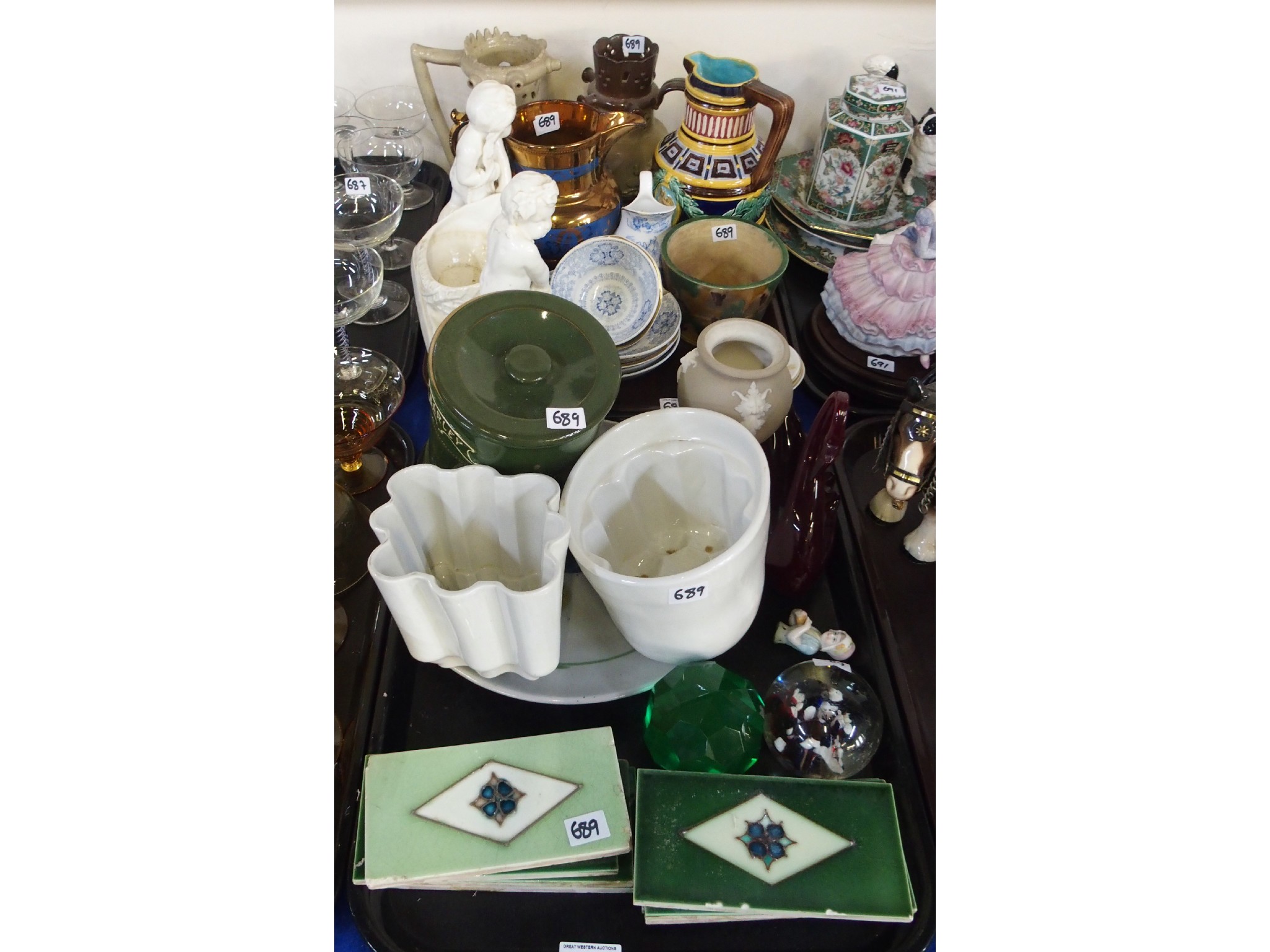 Appraisal: Assorted Victorian ceramics including two puzzle jugs jelly moulds tiles