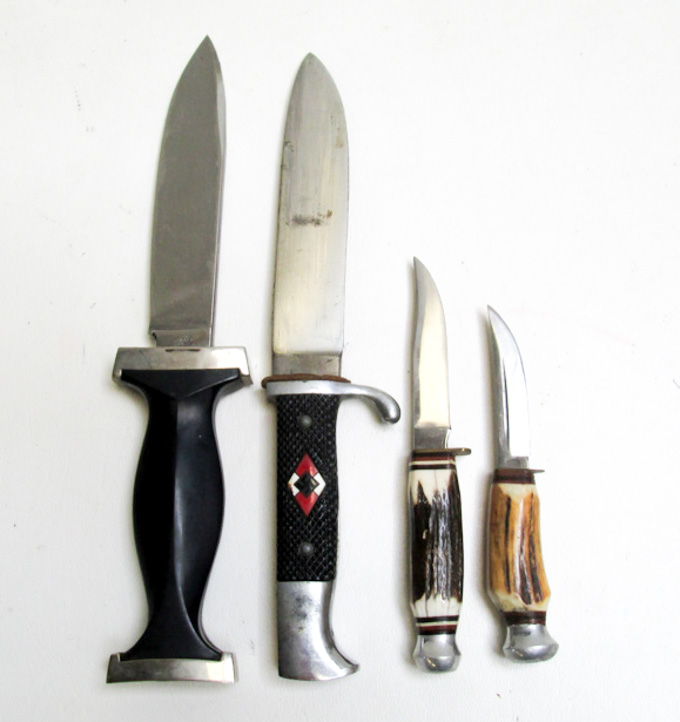 Appraisal: FOUR GERMAN KNIVES Sword Shield small hunter blade stag grip