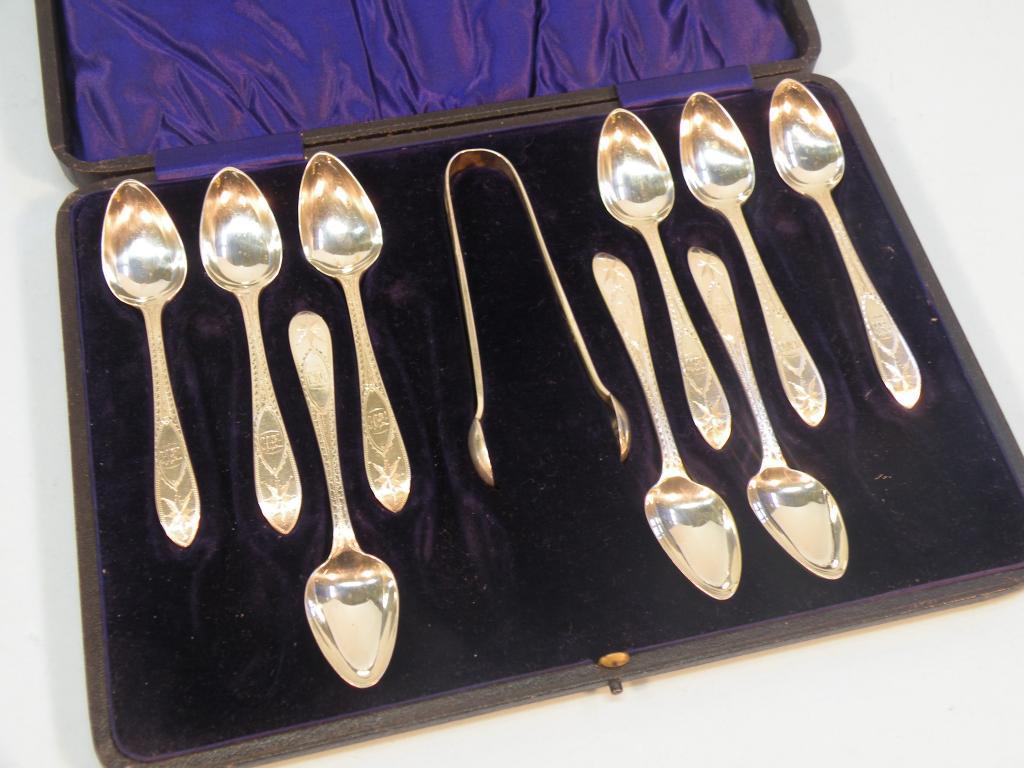 Appraisal: A part set of nine silver teaspoons each with engraved