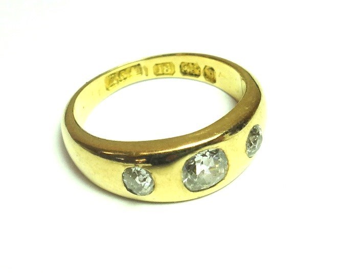 Appraisal: An ct gold and diamond set three stone gypsy ring