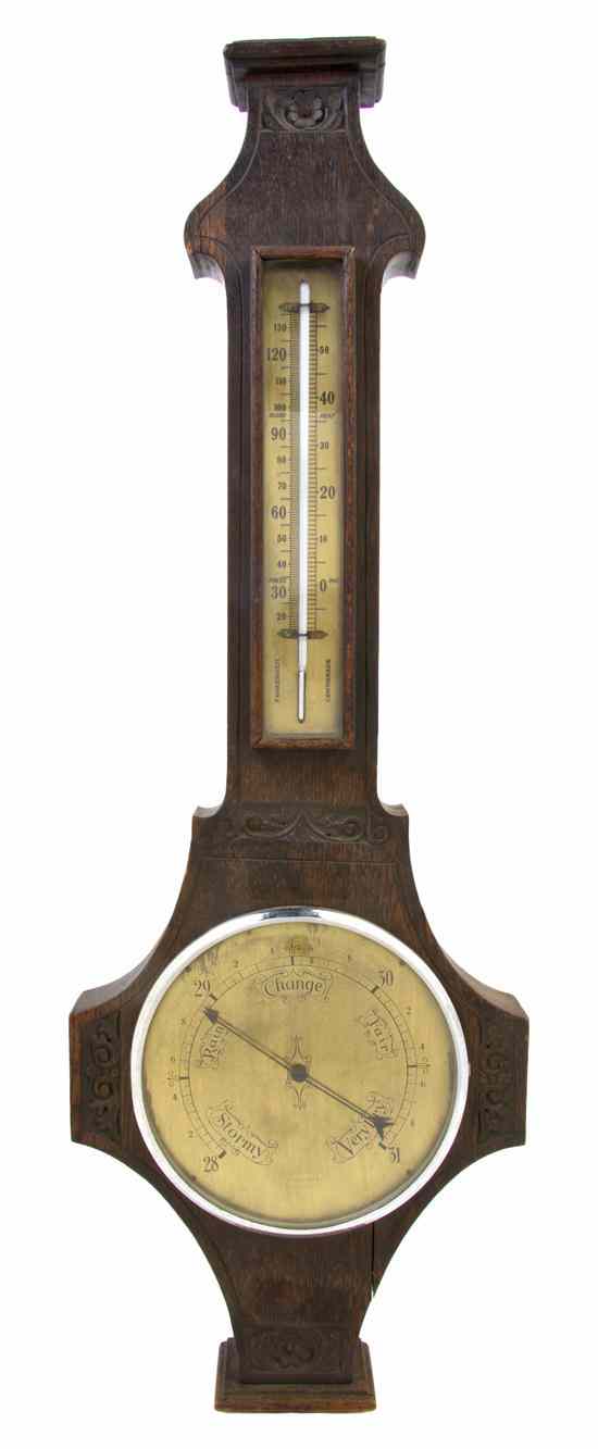 Appraisal: An Oak Wheel Barometer of typical form having barometer and