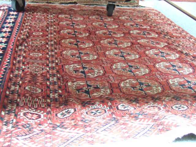 Appraisal: A Tekke Turkomen rug circa the madder field with three