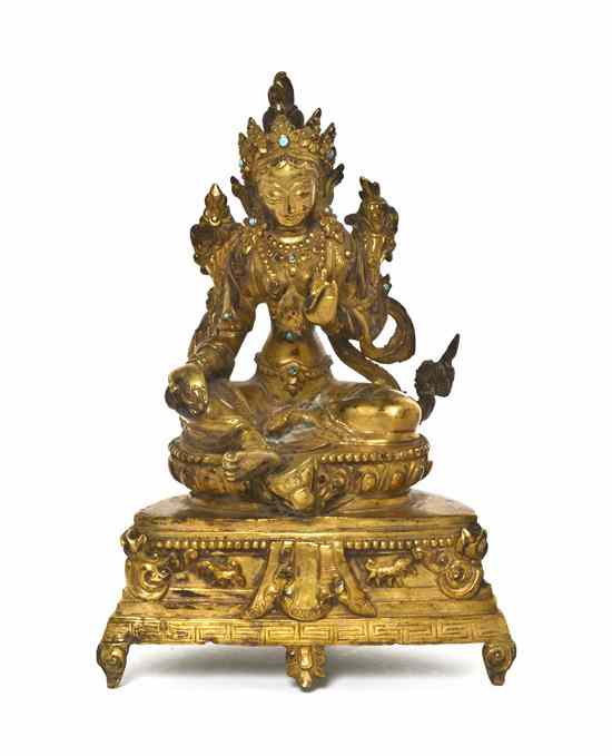 Appraisal: A Gilt Bronze Figure of a Deity likely Nepalese the