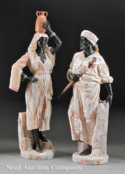 Appraisal: A Pair of Life Size Onyx and Black Marble Figures