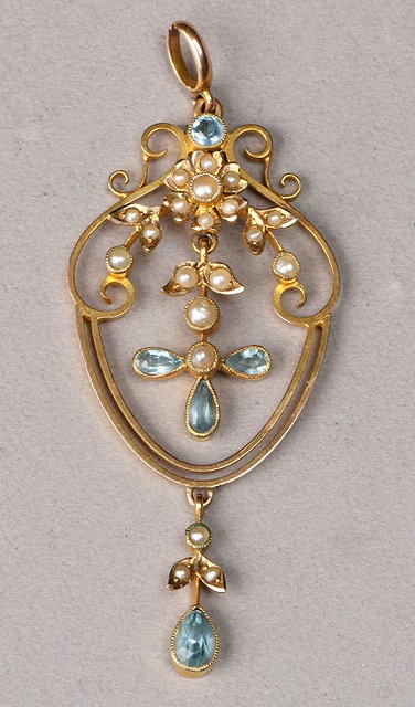 Appraisal: AN EDWARDIAN PEARL AND AQUAMARINE PENDANT half pearls set in