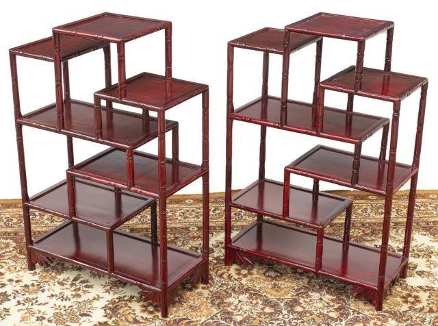 Appraisal: pair Chinese rosewood display shelves each multi-tiered with faux-bamboo carved