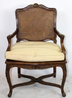 Appraisal: French Louis XV style cane armchair French Louis XV style