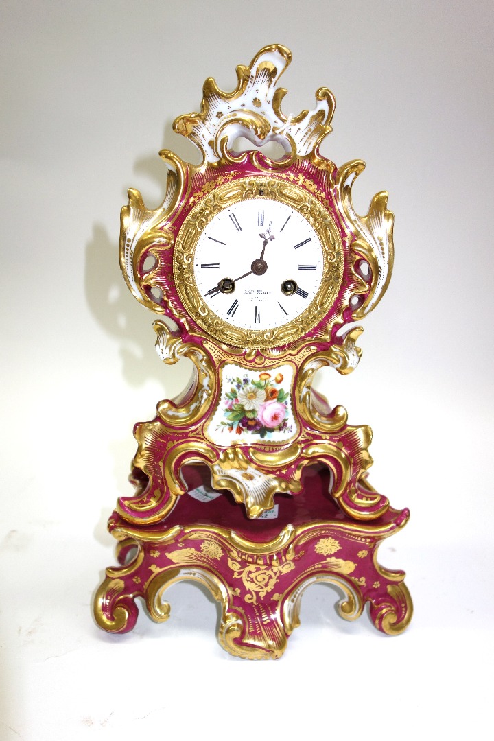 Appraisal: A French porcelain mantel clock late th century with gilt