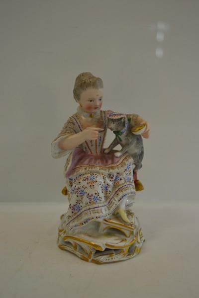 Appraisal: MEISSEN FIGURAL PIECE OF A LADY AND CAT MINOR FAULTS