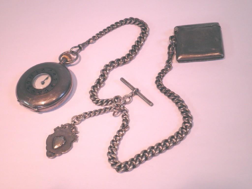 Appraisal: A continental silver half hunter pocket watch with engine turned