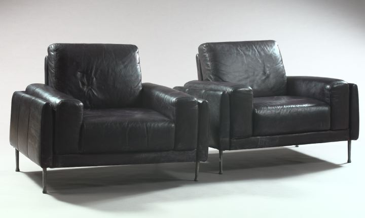 Appraisal: Pair of Post-Modern Black Leather Armchairs each with a padded