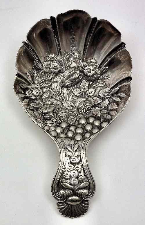 Appraisal: A Victorian silver caddy spoon the scalloped bowl and handle