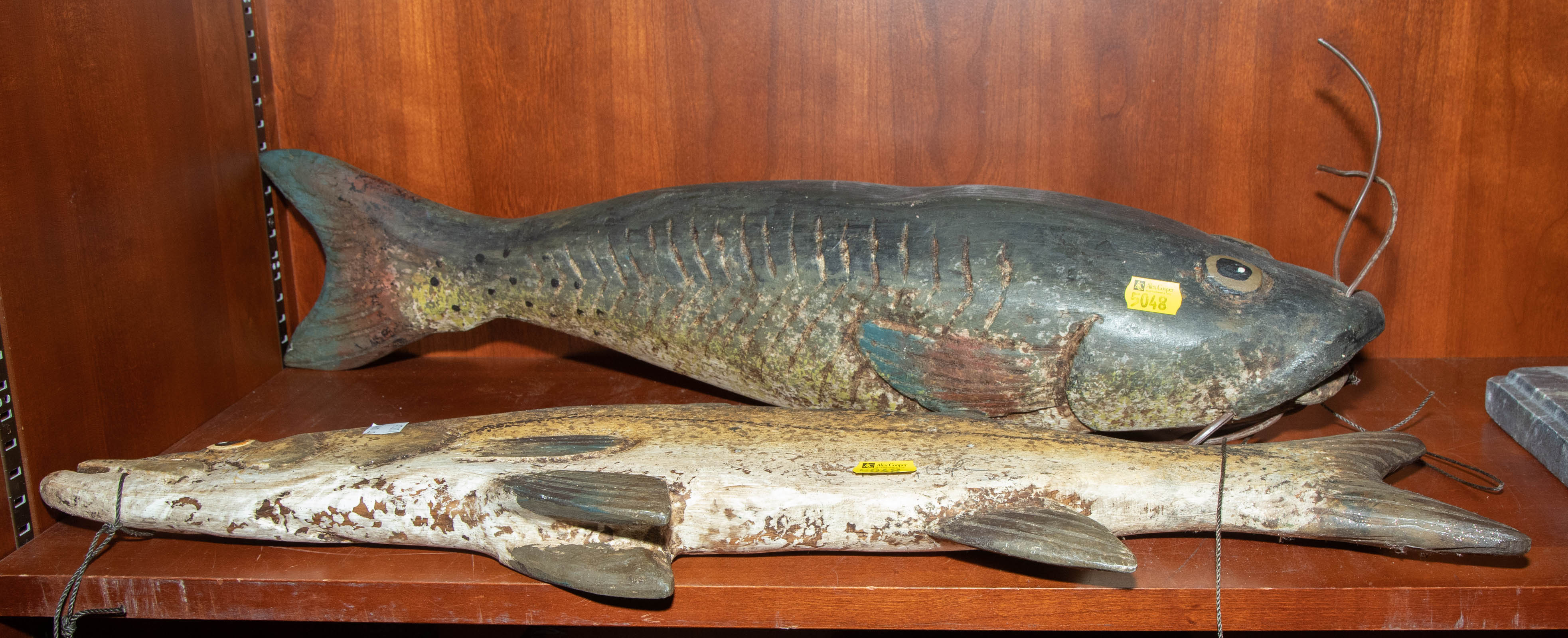 Appraisal: TWO FOLK ART CARVED WOODEN FISH