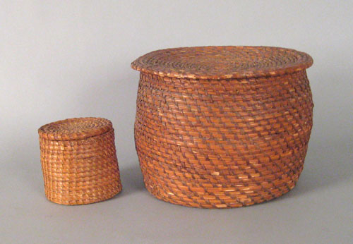 Appraisal: Two Pennsylvania rye straw lidded baskets th c h h