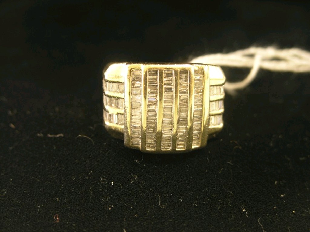 Appraisal: A large gentleman's ct gold and dimaond ring numerous small