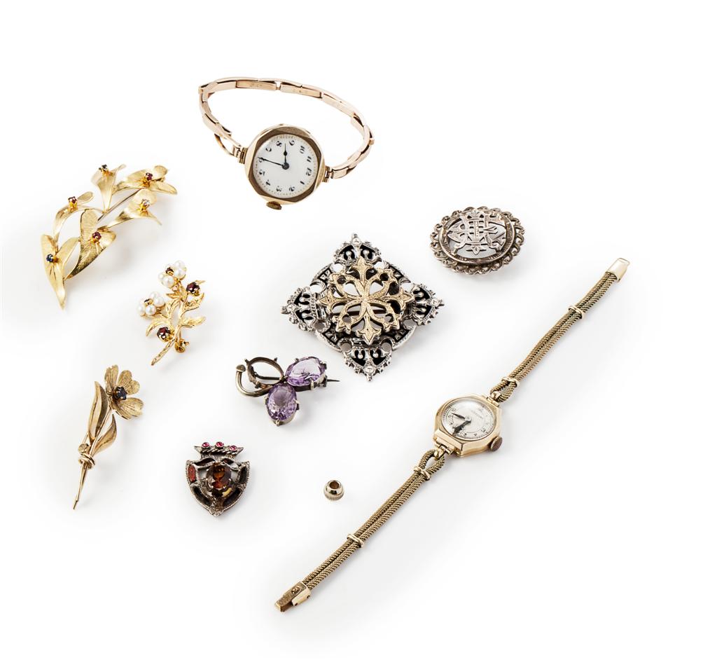 Appraisal: A collection of brooches to include three multi-gem set brooches