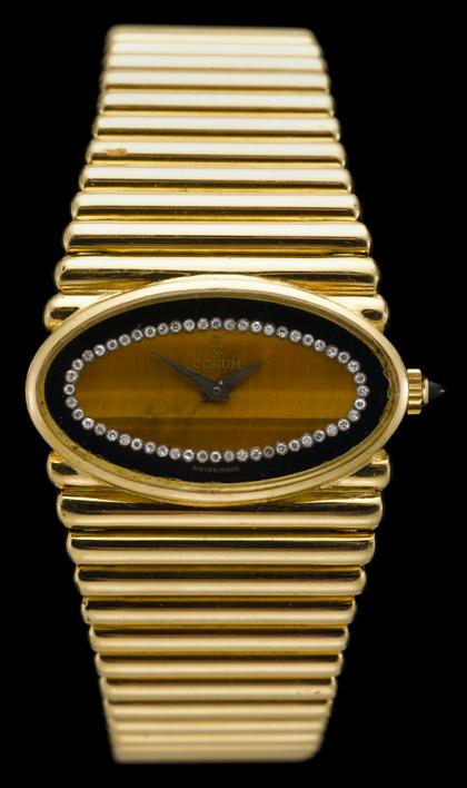 Appraisal: Lady's karat yellow gold wristwatch Corum Oval case tiger's eye