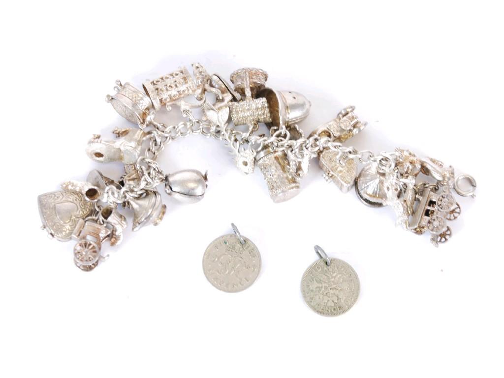 Appraisal: SILVER CHARM BRACELET EST -