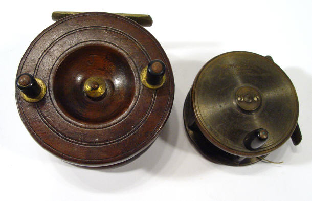 Appraisal: A NCJL metal fishing reel and a mahogany and brass