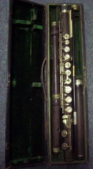 Appraisal: A Rudall Carte cocus flute no with repair receipt dated