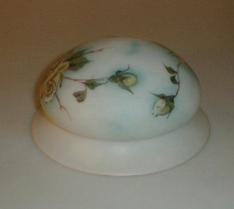 Appraisal: An opaline glass light bowl painted with roses dia