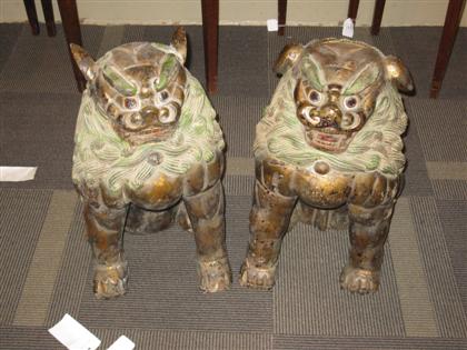 Appraisal: Pair Chinese carved and gilt painted fu lions th century