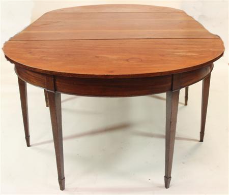 Appraisal: A Georgian style mahogany D-end dining table the top with