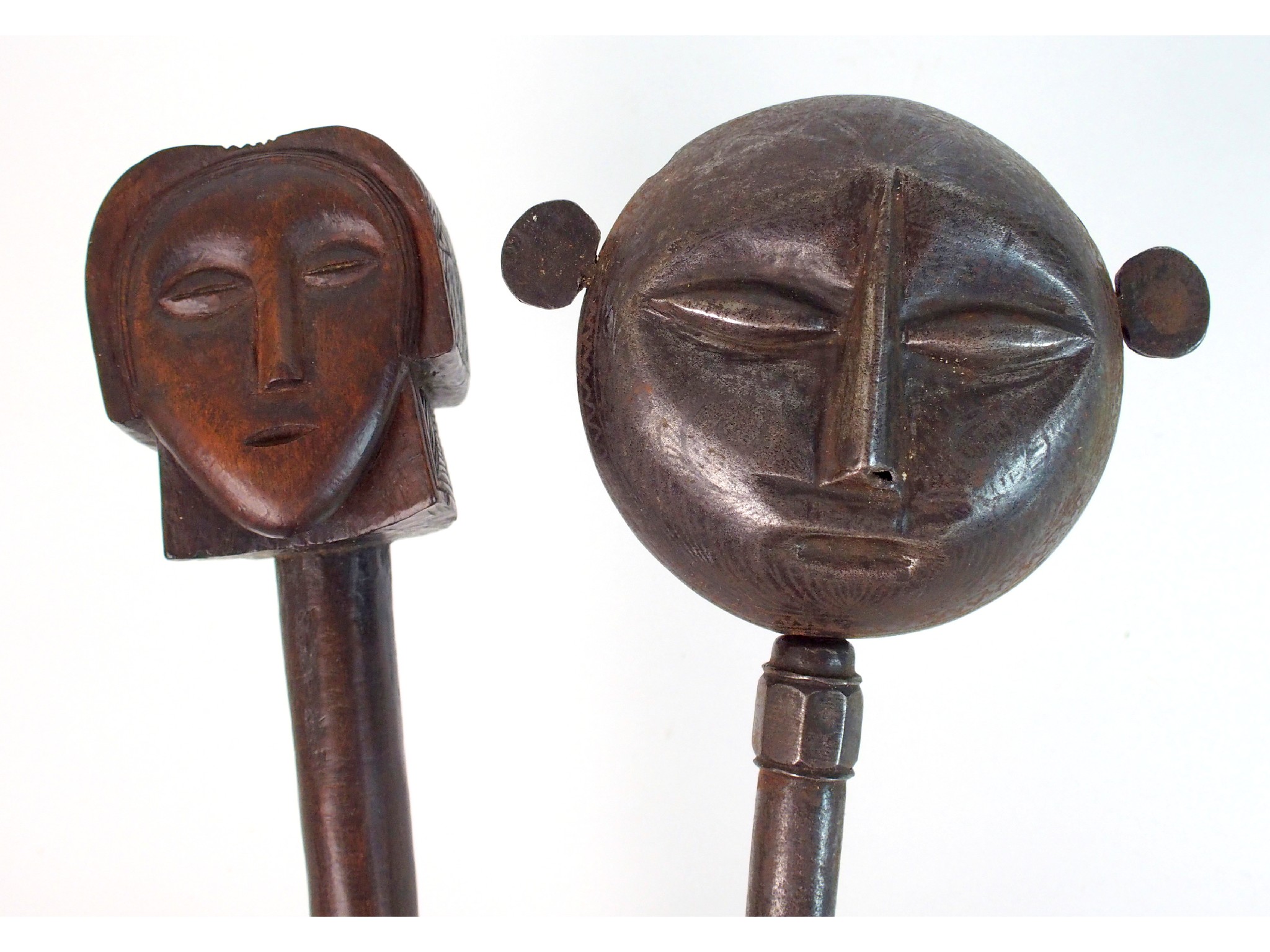 Appraisal: An Indian steel ceremonial staffwith embossed head terminal and cast