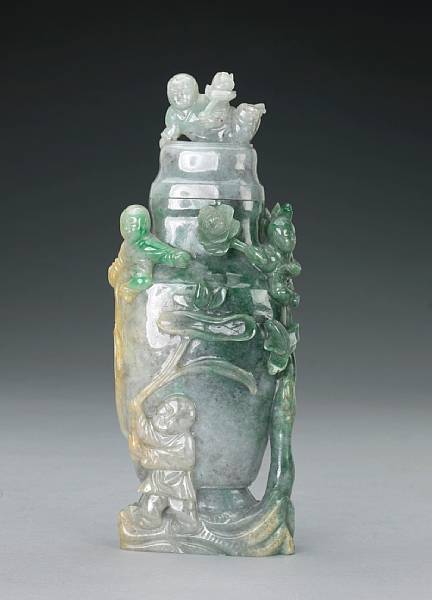 Appraisal: A mottled green jadeite covered vase th Century Of flattened